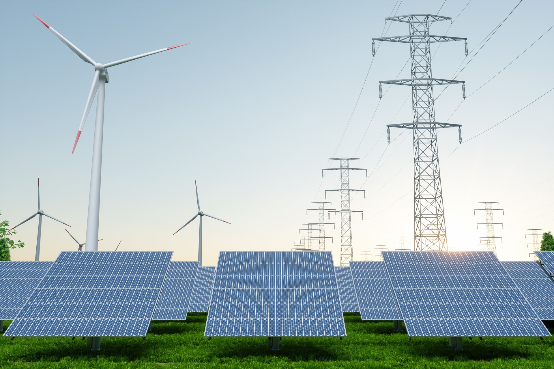 Front View Of Solar Panels With High Voltage Towers And Wind Turbines Background. Green Energy Concept