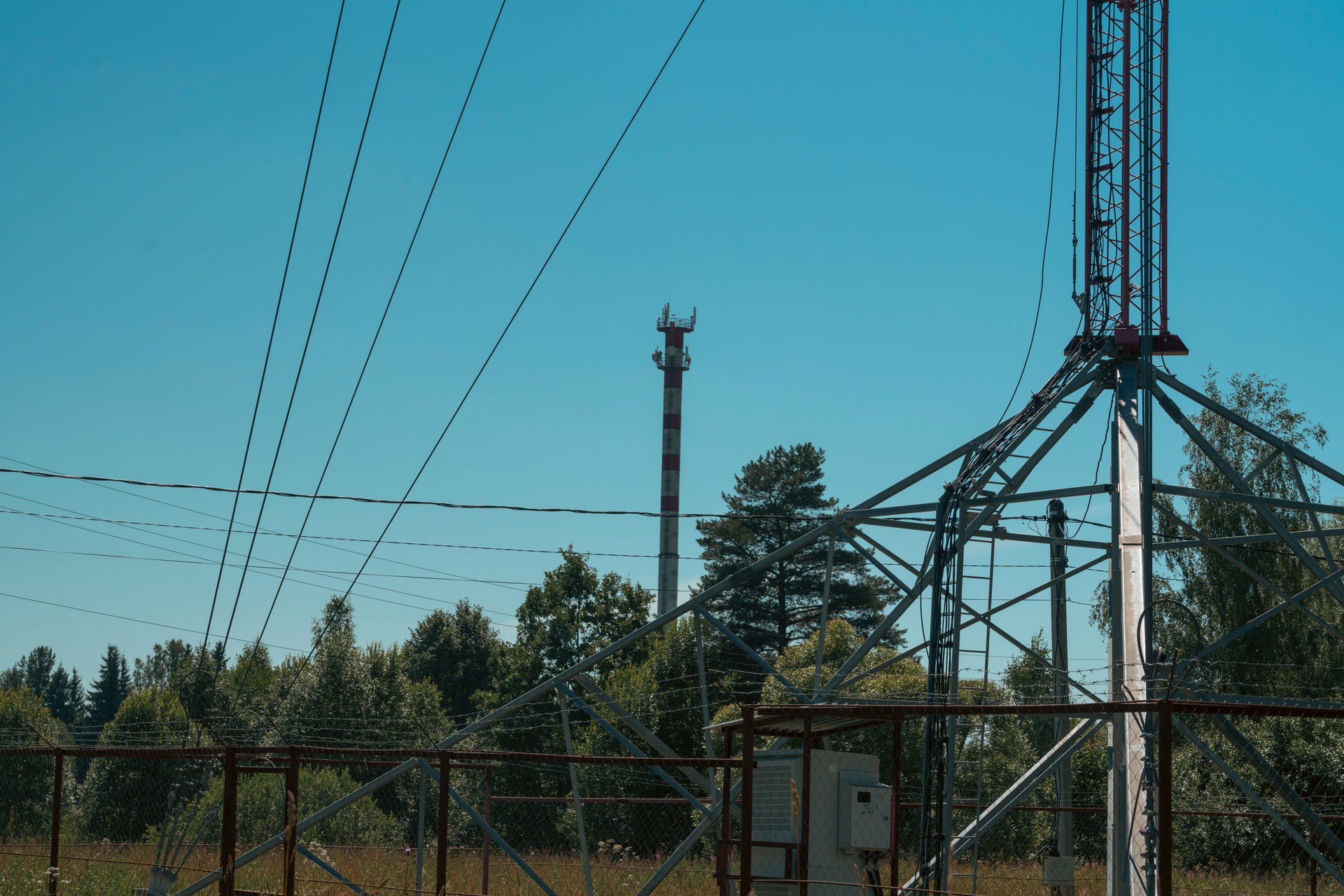 Utility structures and power lines in rural setting